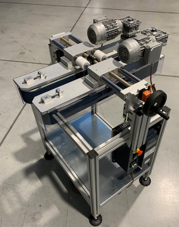 Double vertical conveyor with adjustment